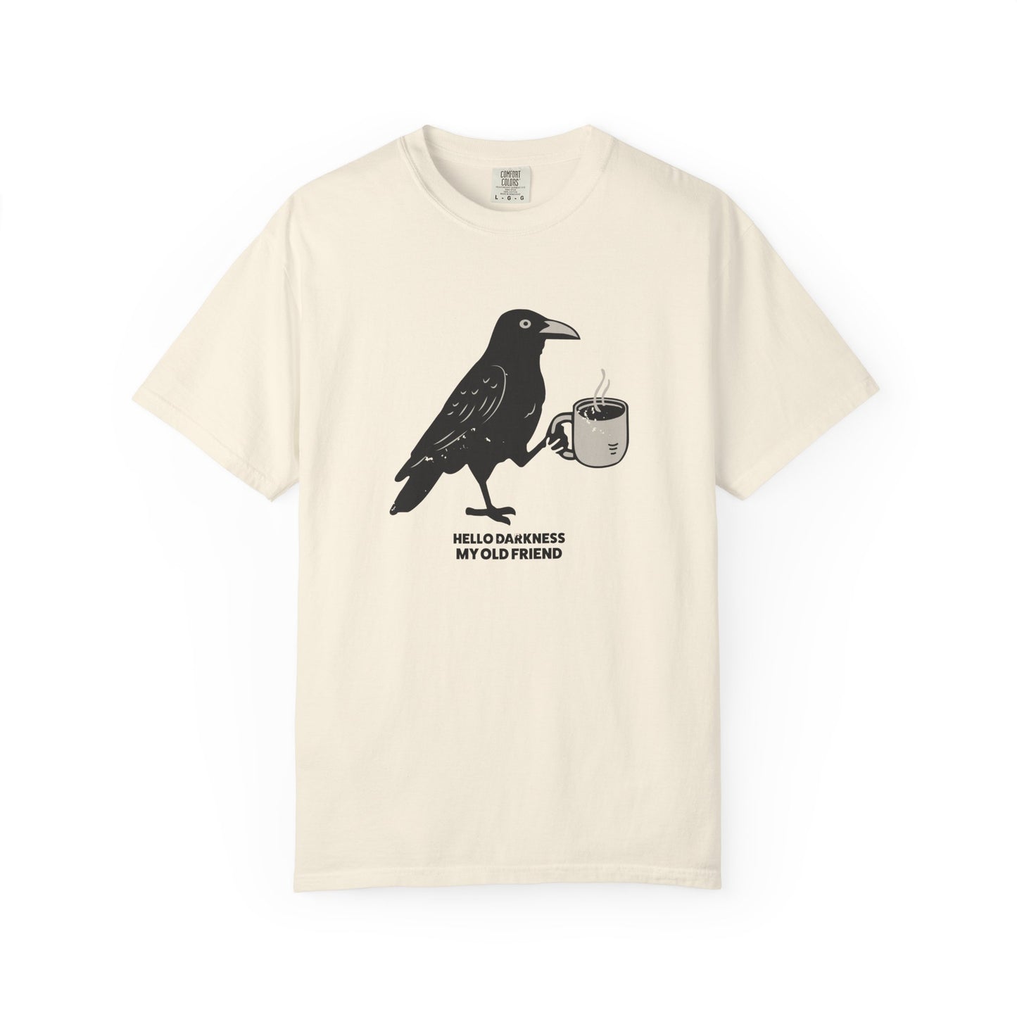 Beige t-shirt with a black crow holding a cup design on a white background