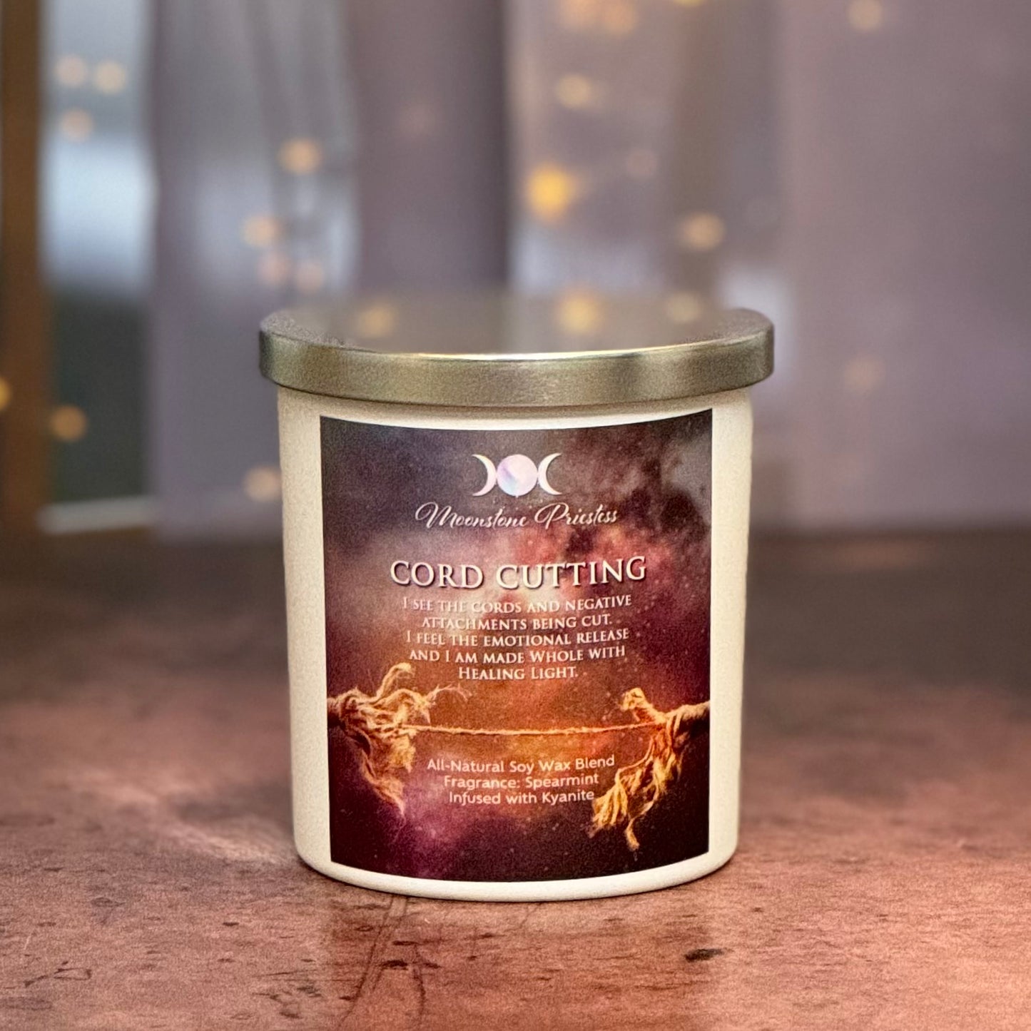 Candle with a label on a wooden surface