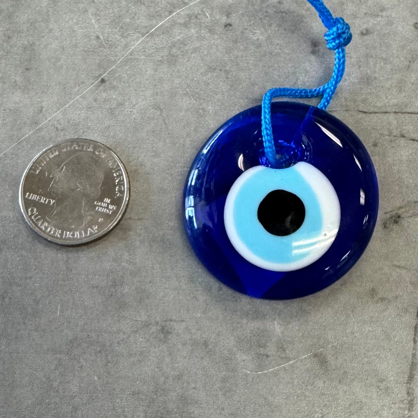 Small glass evil eye hanging protection
