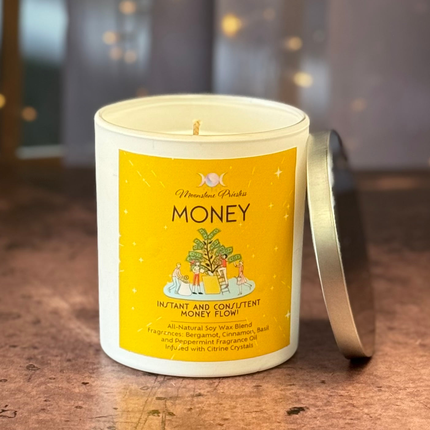 Candle with a yellow label on a wooden surface