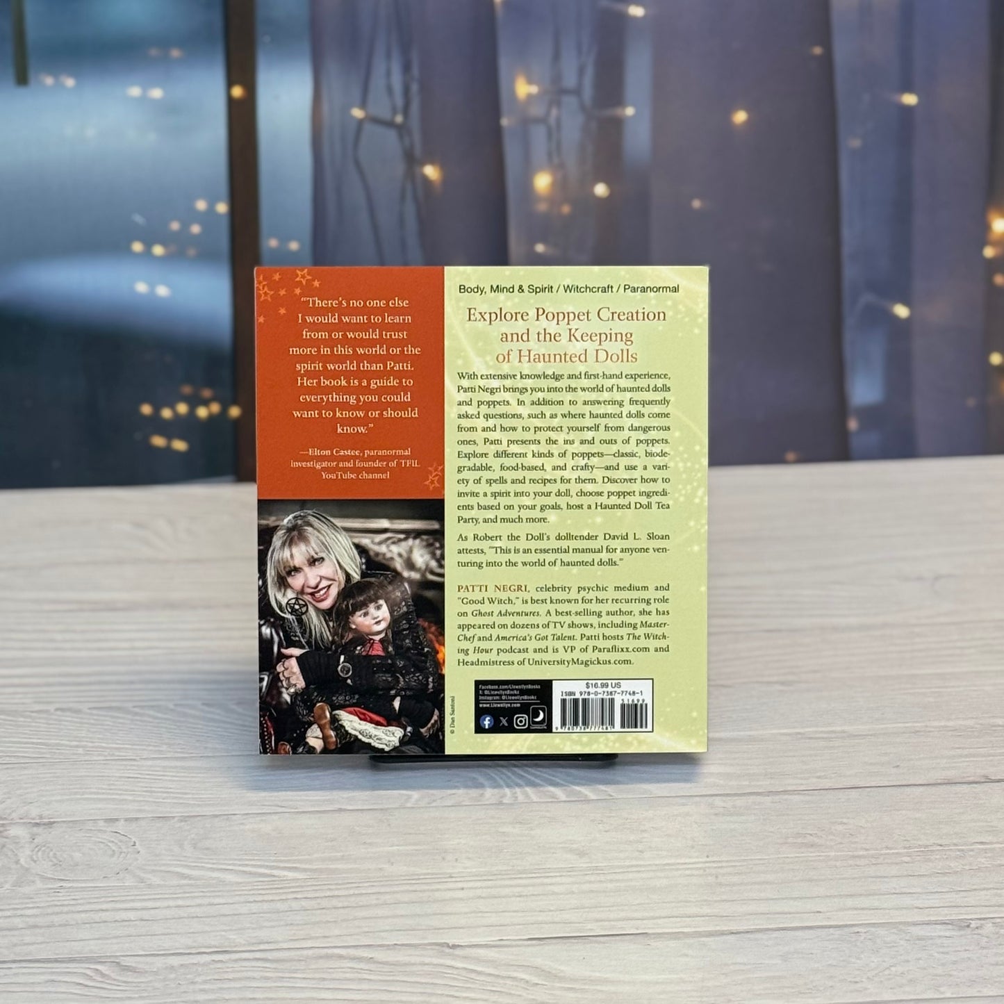 Book cover with text and a photo of a woman and child on a wooden surface with a blurred background