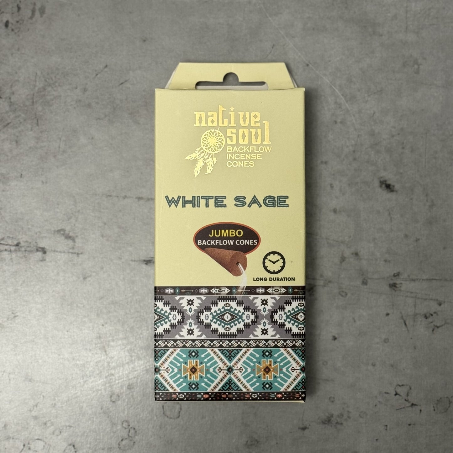 Packaging of Native Soul White Sage backflow incense cones on a gray background