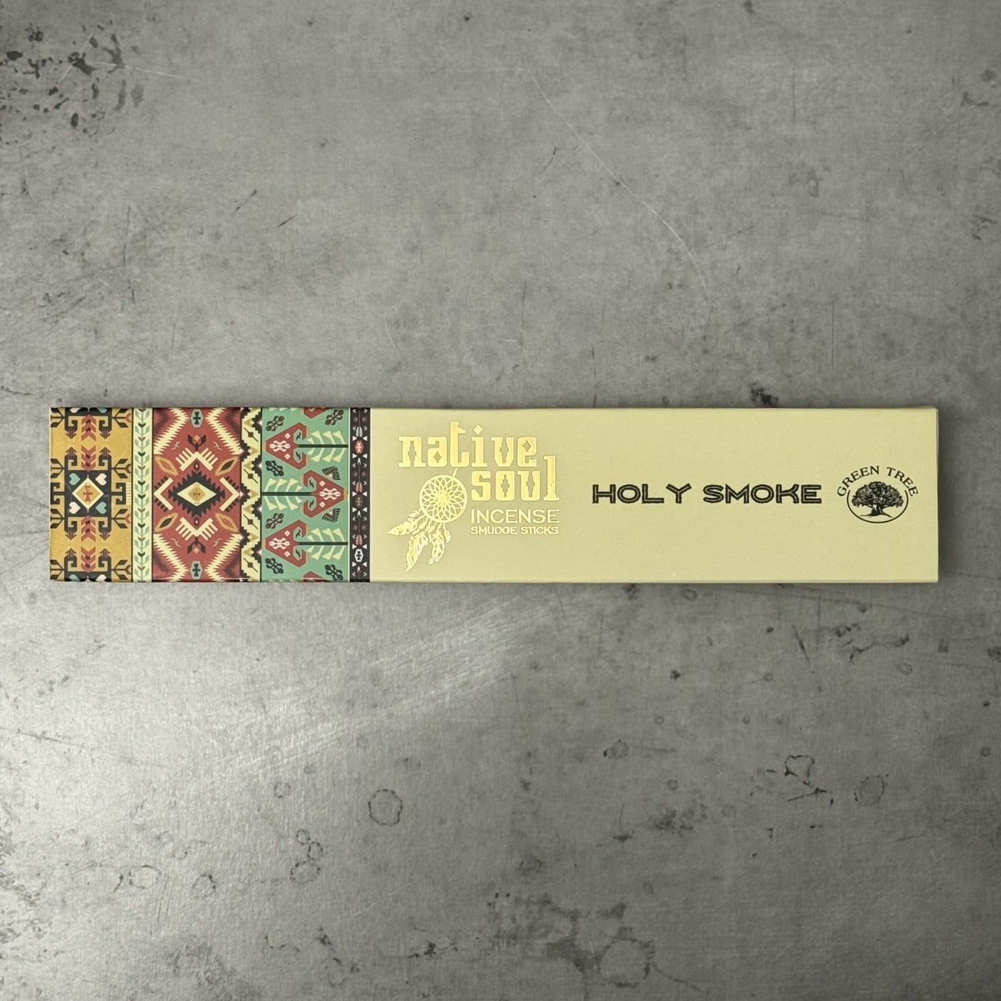 Green Tree Native Soul Holy Smoke Incense packaging on a gray surface