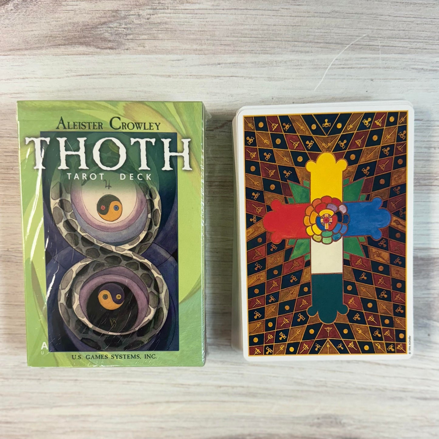 Thoth Tarot by Aleister Crowley and back of cards