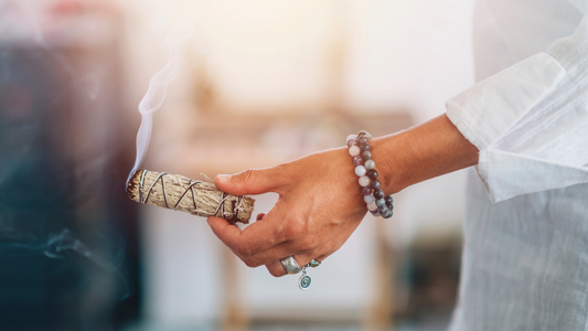 Empath holding sage