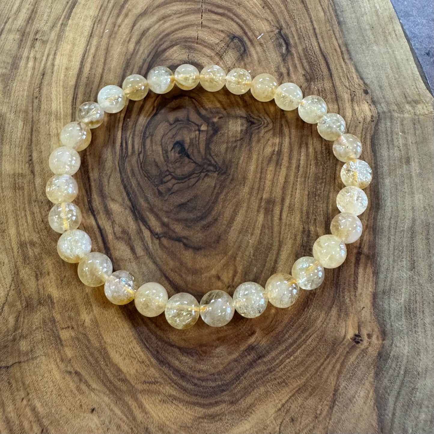 Beaded bracelet on a wooden surface