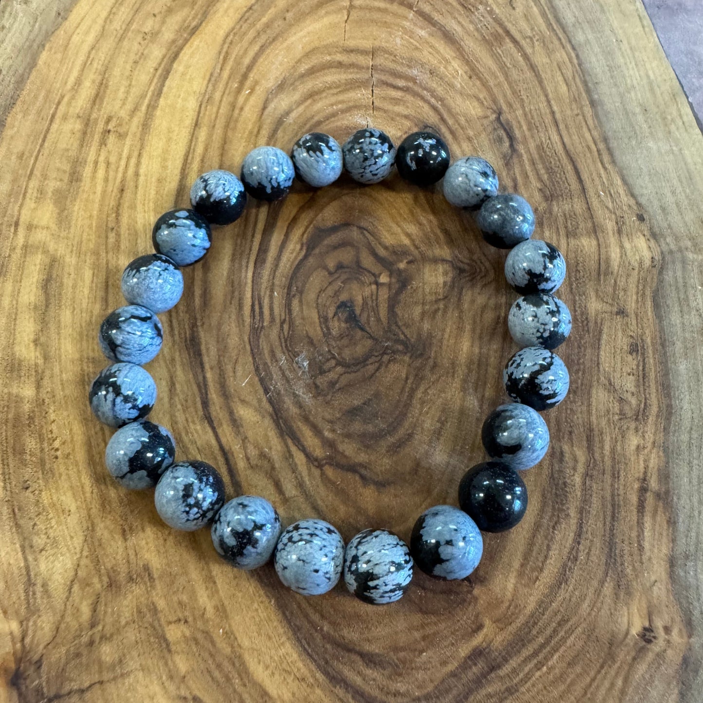 Beaded bracelet on a wooden surface
