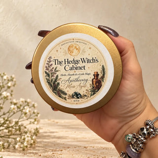 Hand-poured Hedge Witch's Cabinet crystal candle for altar, hearth, and herb work