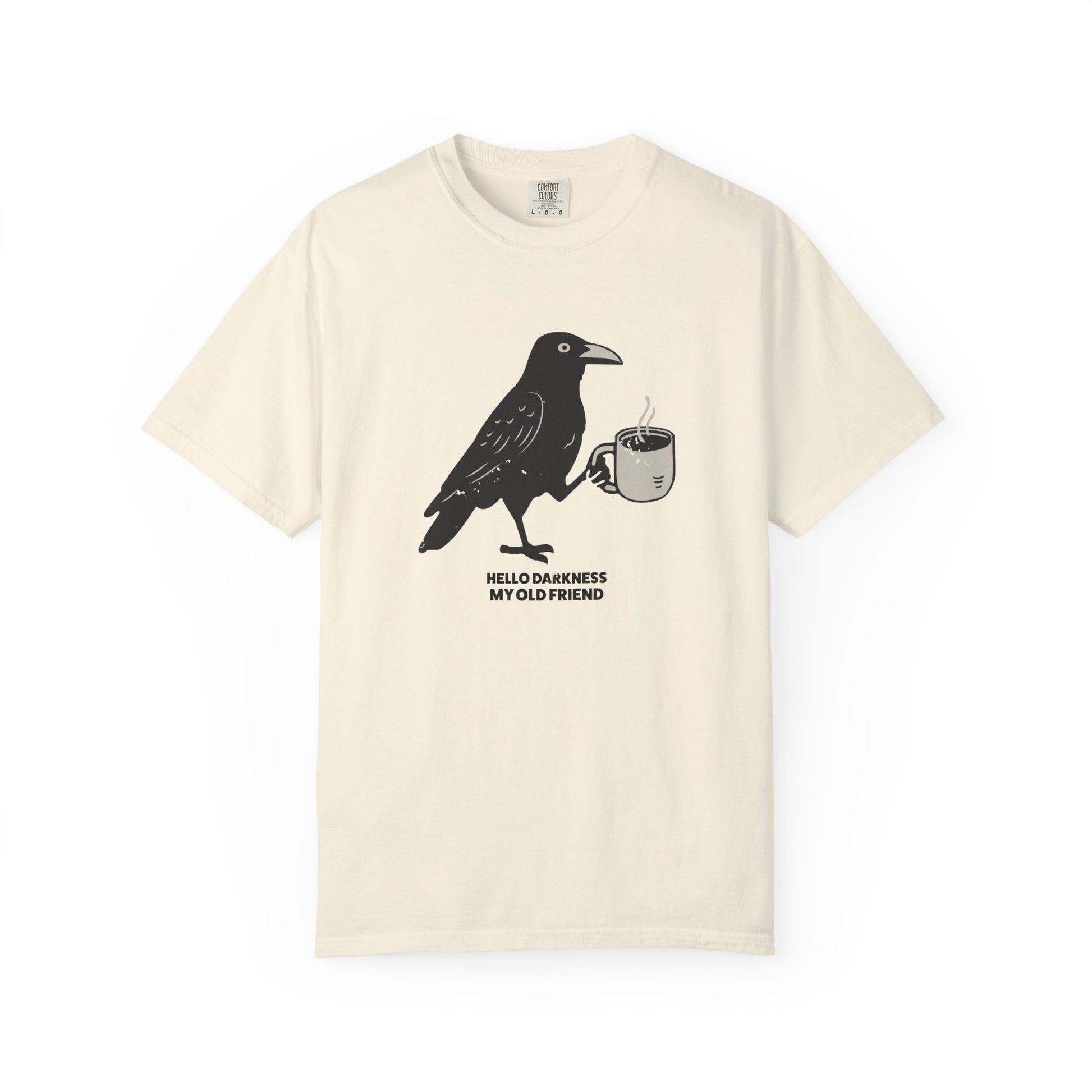 Beige t-shirt with a black crow holding a cup design on a white background