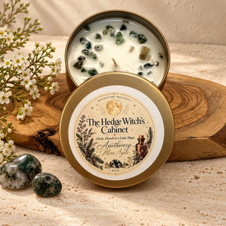 The Hedge Witch's Cabinet Apothecary candle in a bronze tin with moss agate chips by Moonstone Priestess