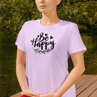 Heather Prism Lilac Be Happy t-shirt with hand-lettered script, hearts, and a leaf design, worn outdoors