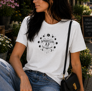 Ash grey Spiritual AF moon phase graphic tee worn outdoors