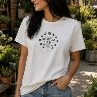Ash grey Spiritual AF moon phase tee worn outdoors in a garden setting