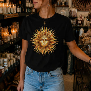 Vintage sun face t-shirt with warm hand-drawn celestial sun design on garment-dyed cotton