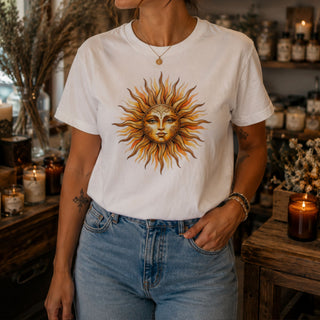 Vintage sun face t-shirt with warm hand-drawn celestial sun design on garment-dyed cotton