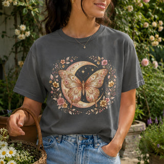 Boho butterfly moon t-shirt with hand-drawn moth, crescent moon, and floral design on garment-dyed cotton