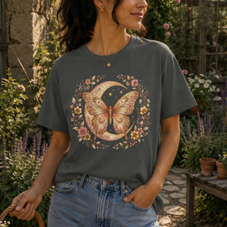 Boho butterfly moon t-shirt with hand-drawn moth, crescent moon, and floral design on garment-dyed cotton