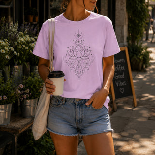 Cotton tee printed with a black line-art lotus, deer skull, crescent moon, and stars.