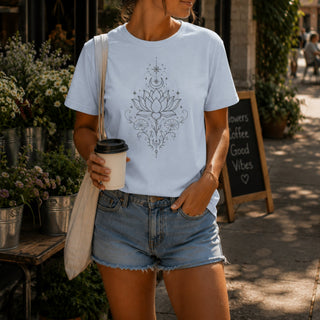 Cotton tee printed with a black line-art lotus, deer skull, crescent moon, and stars.