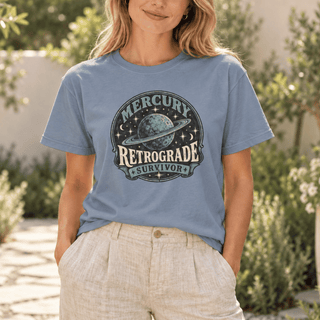 Mercury Retrograde Survivor T-Shirt in Blue Jean with a vintage planet and stars design