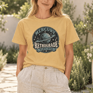 Mercury Retrograde Survivor T-Shirt in Mustard with a vintage planet and stars design