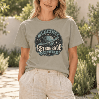 Mercury Retrograde Survivor T-Shirt in Sandstone with a vintage planet and stars design