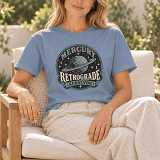 Mercury Retrograde Survivor T-Shirt in Blue Jean, astrology graphic tee