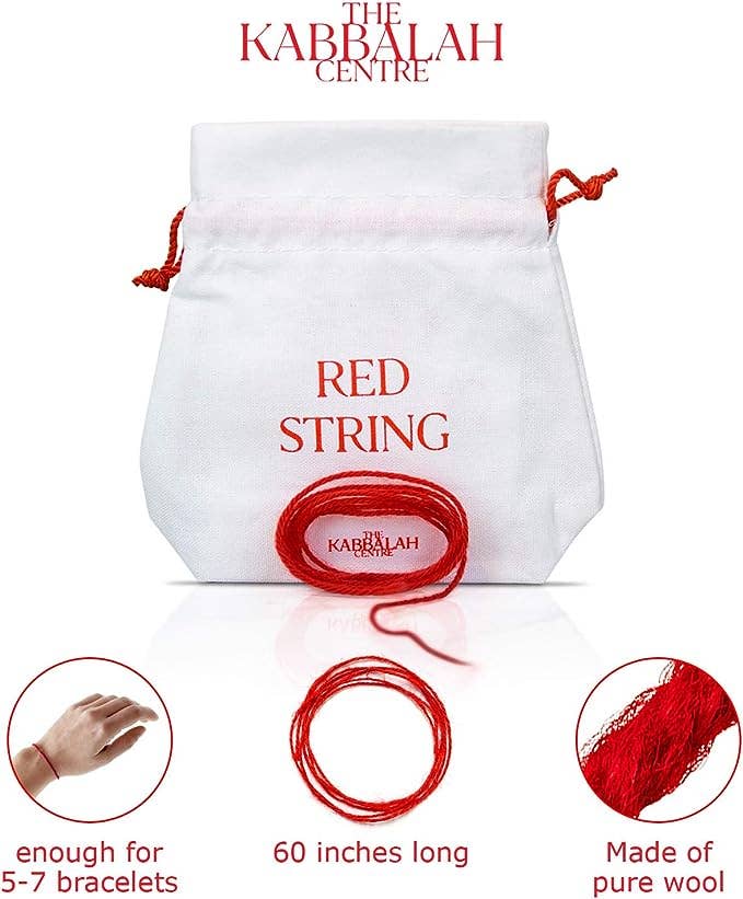 Red string with 'The Kabbalah Centre' branding on a white drawstring bag.