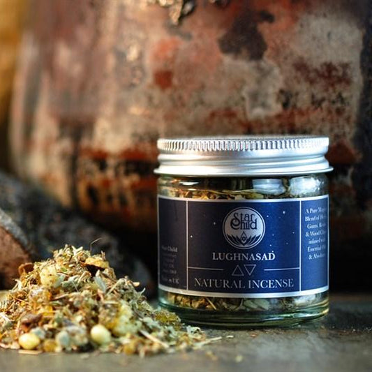 Jar of natural incense with a label on a rustic background