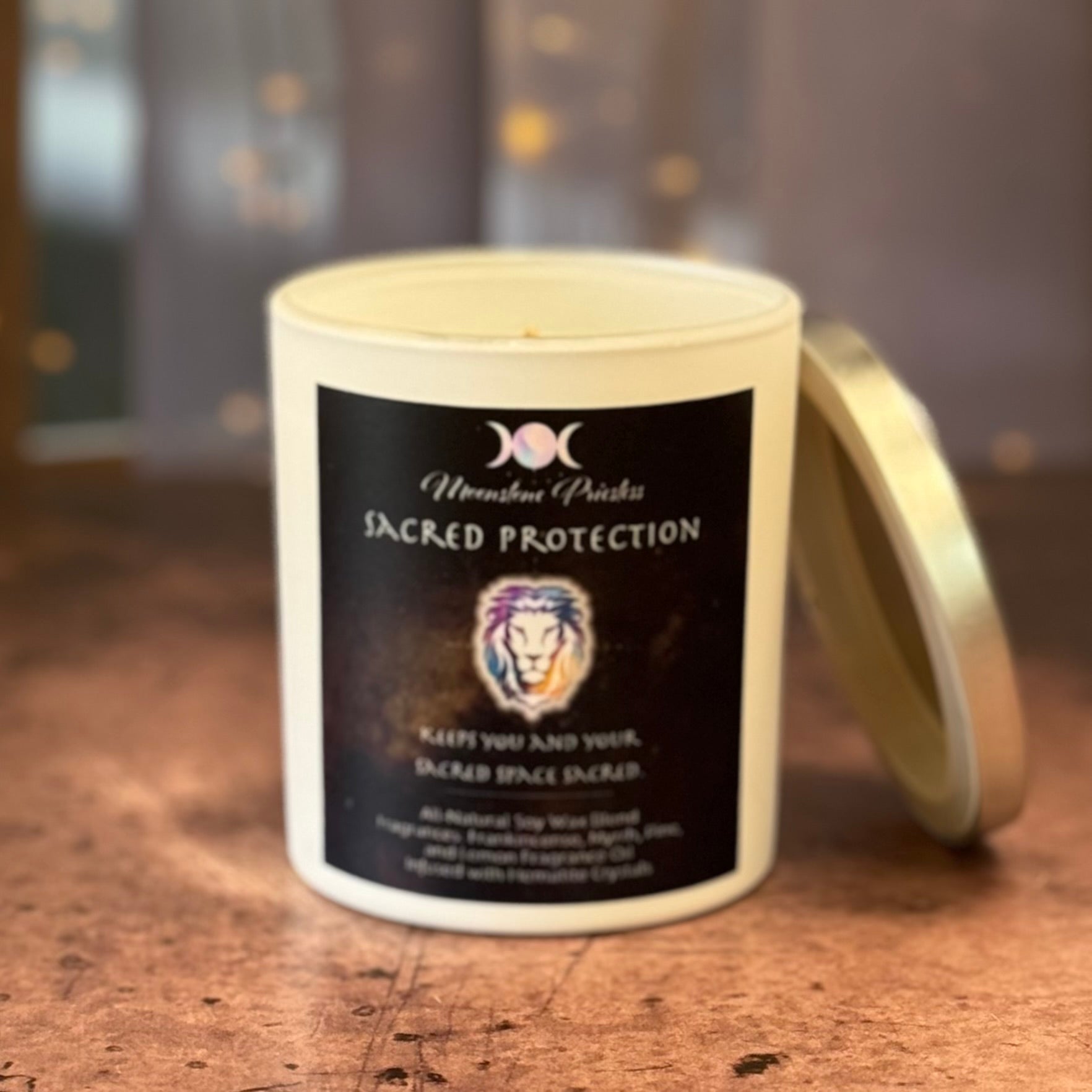 Candle with a label on a wooden surface