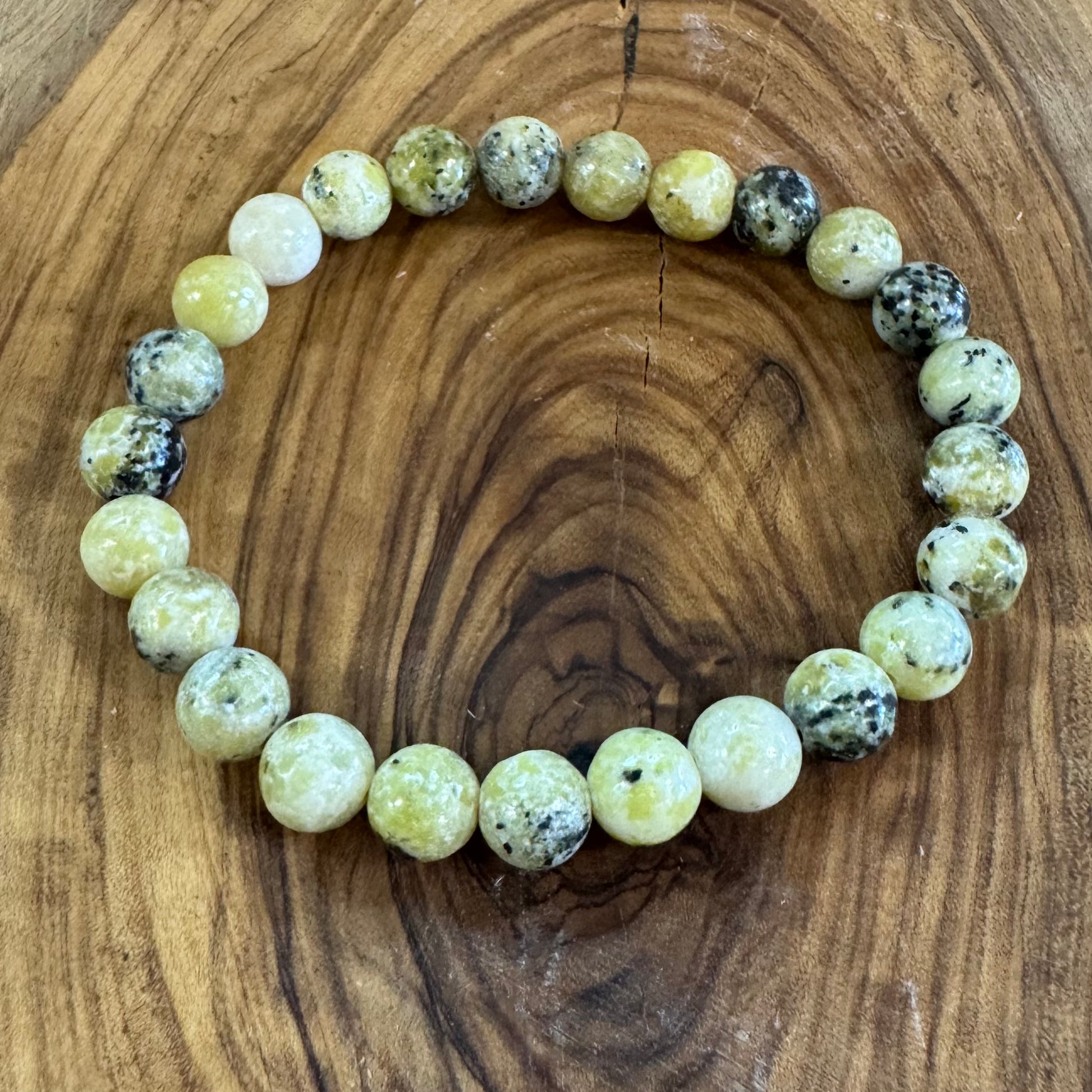 Beaded bracelet on a wooden surface