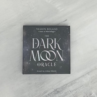 Dark Moon Oracle card box on a marble surface