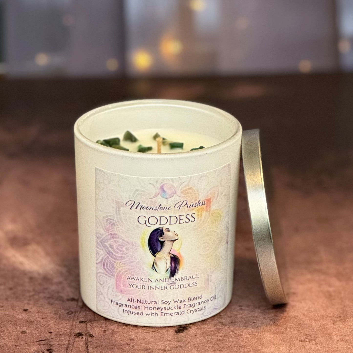 Candle in a white container with a label on a wooden surface