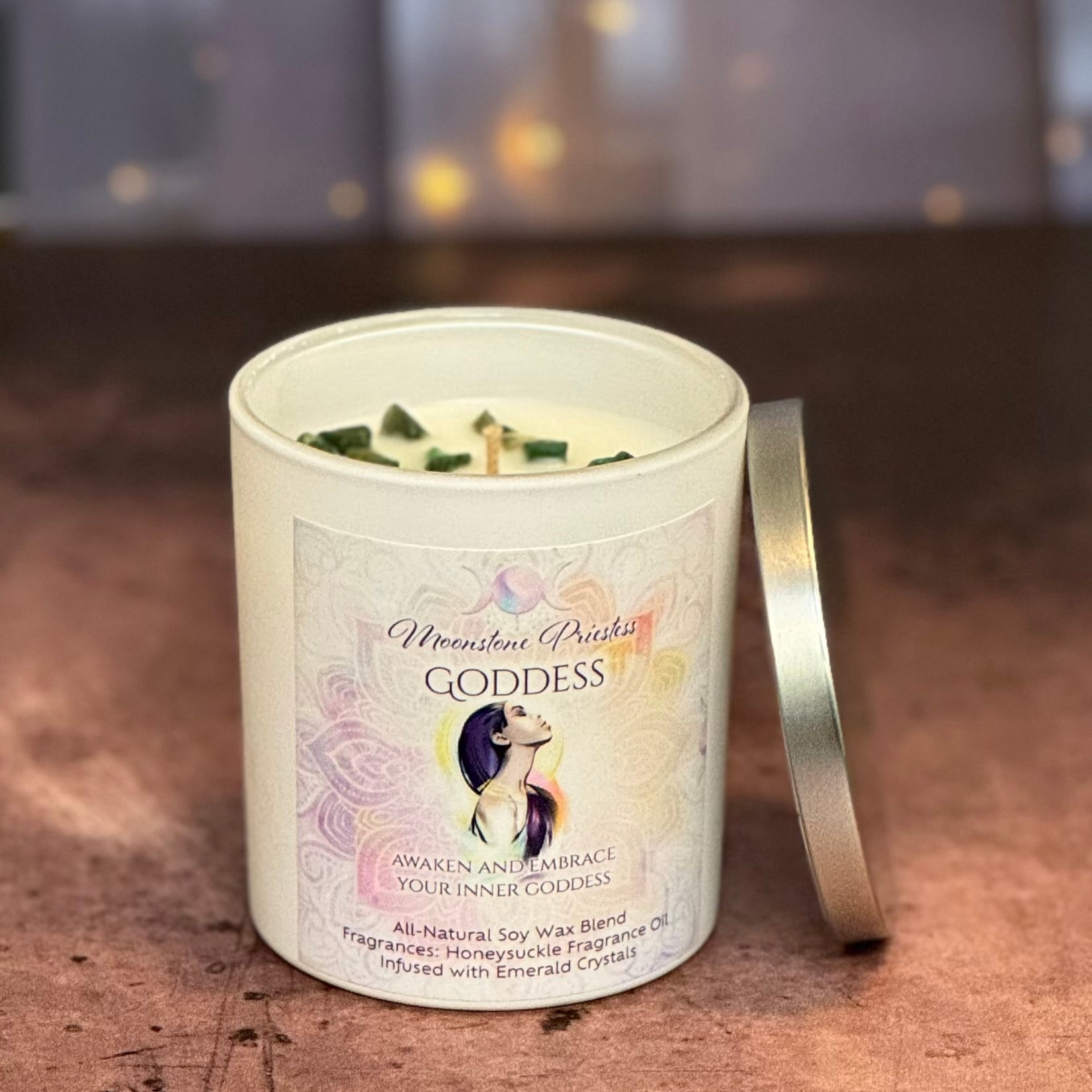 Candle in a white container with a label on a wooden surface
