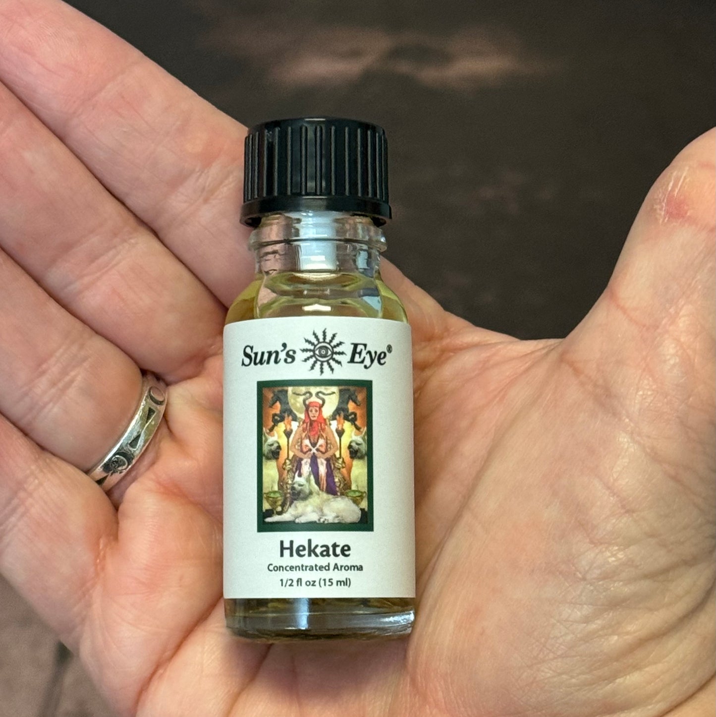 Hekate oil in hand