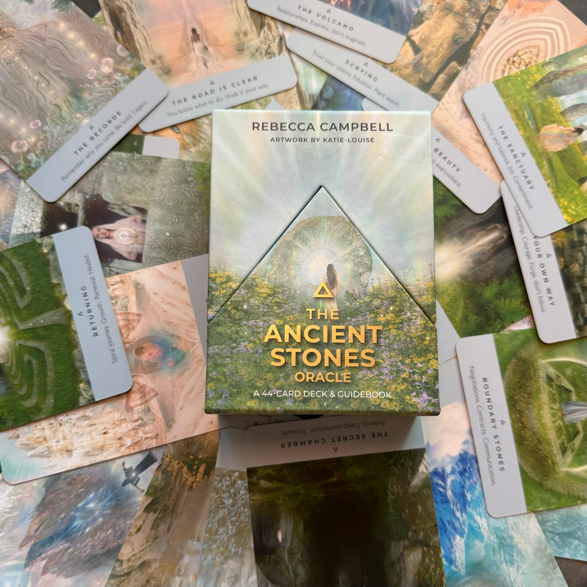 The Ancient Stone Oracle by Rebecca Campbell front of deck