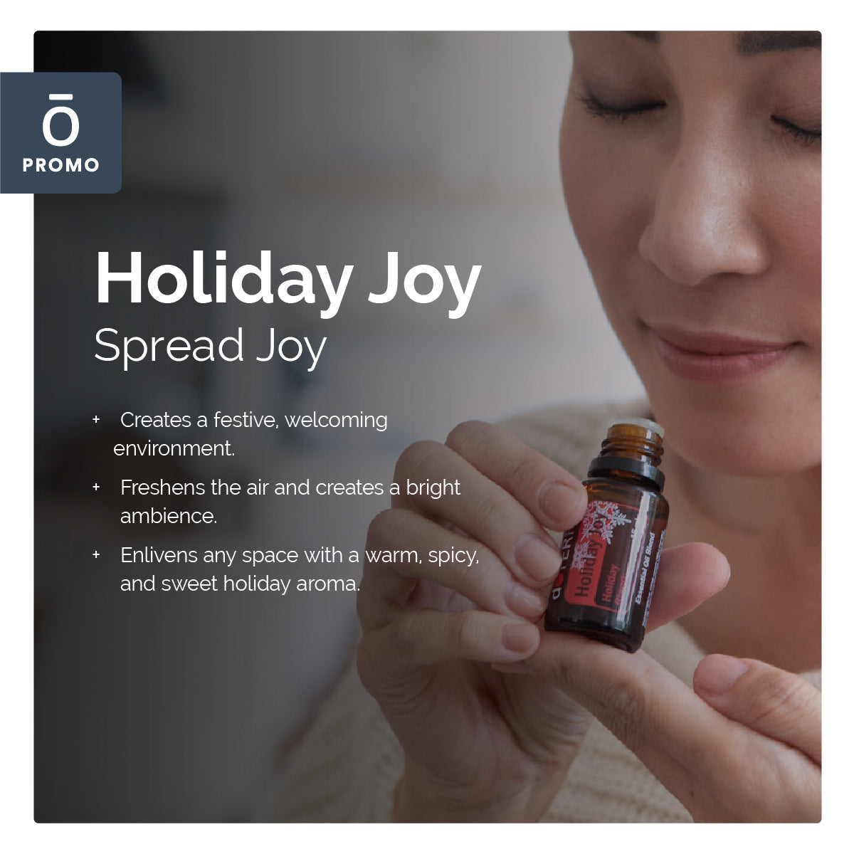 Person holding a small bottle with 'Holiday Joy' text and product description.