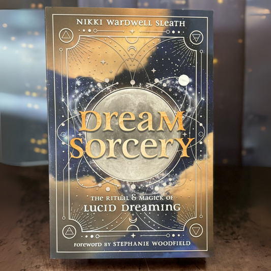 Book cover of 'Dream Sorcery' with celestial design and gold text.