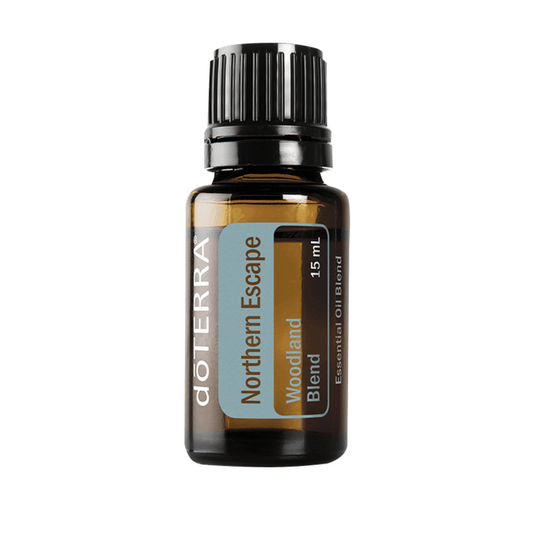 doTERRA Northern Escape Woodland Blend essential oil bottle on a white background