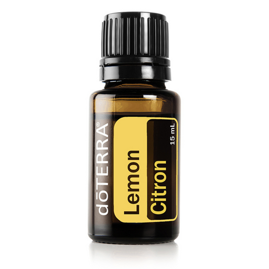 doTERRA Lemon essential oil bottle on a white background