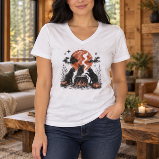 Cat Coven Cauldron Moon V-Neck tee in White, black cats around a cauldron under an orange moon