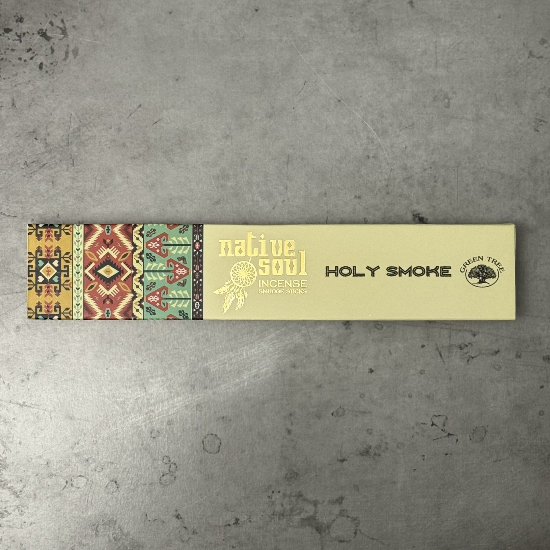 Green Tree Native Soul Holy Smoke Incense packaging on a gray surface