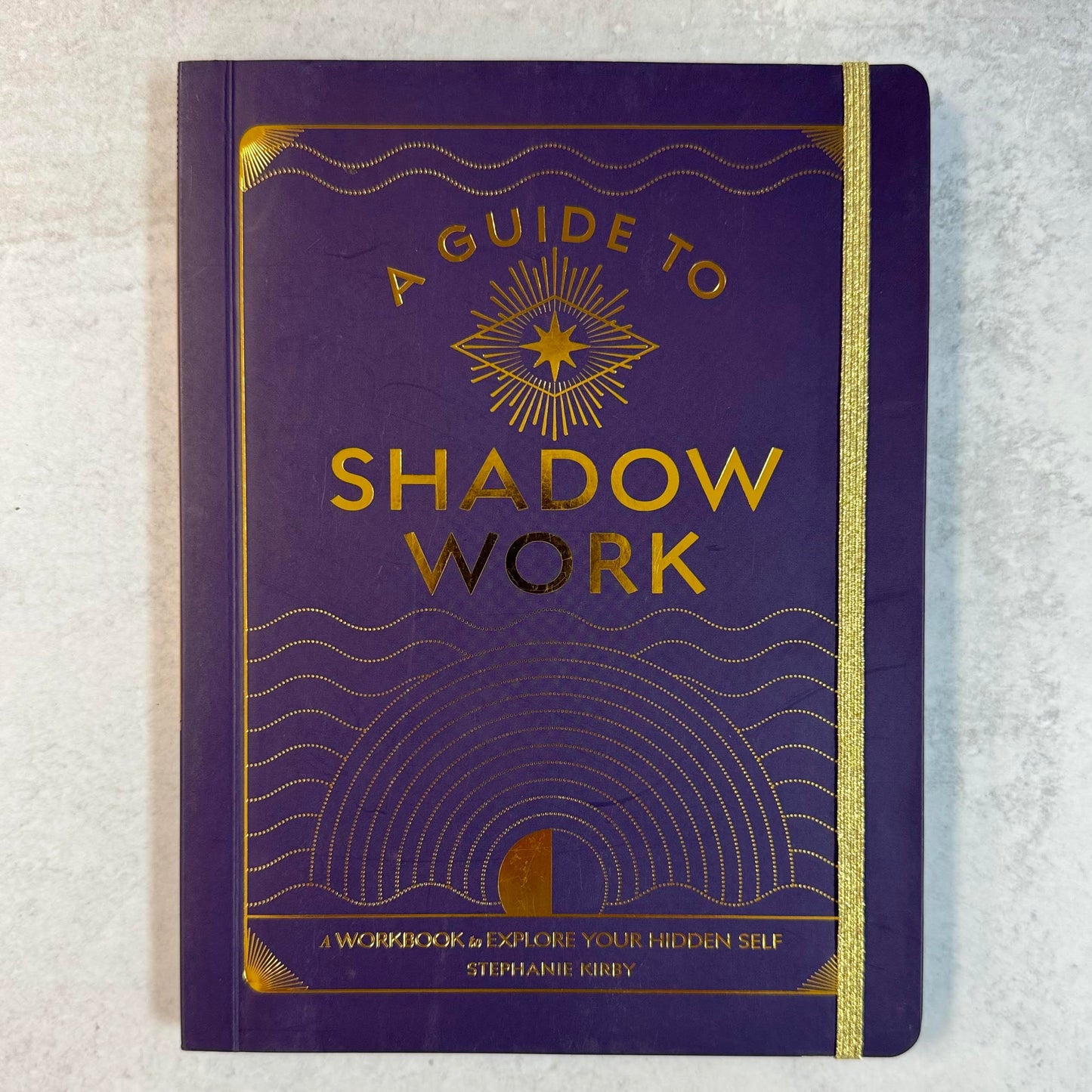 A Guide to Shadow Work: A Workbook to Explore Your Hidden Self by Stephanie Kirby front of book