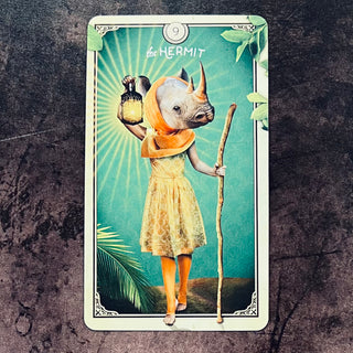 the hermit card with brown board